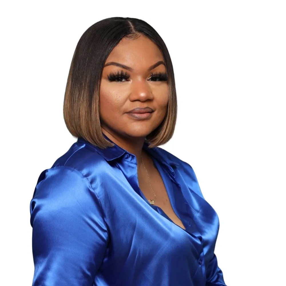 Confident woman in a shiny blue blouse against a white background.