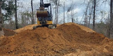 Excavation on a house pad, moving dirt