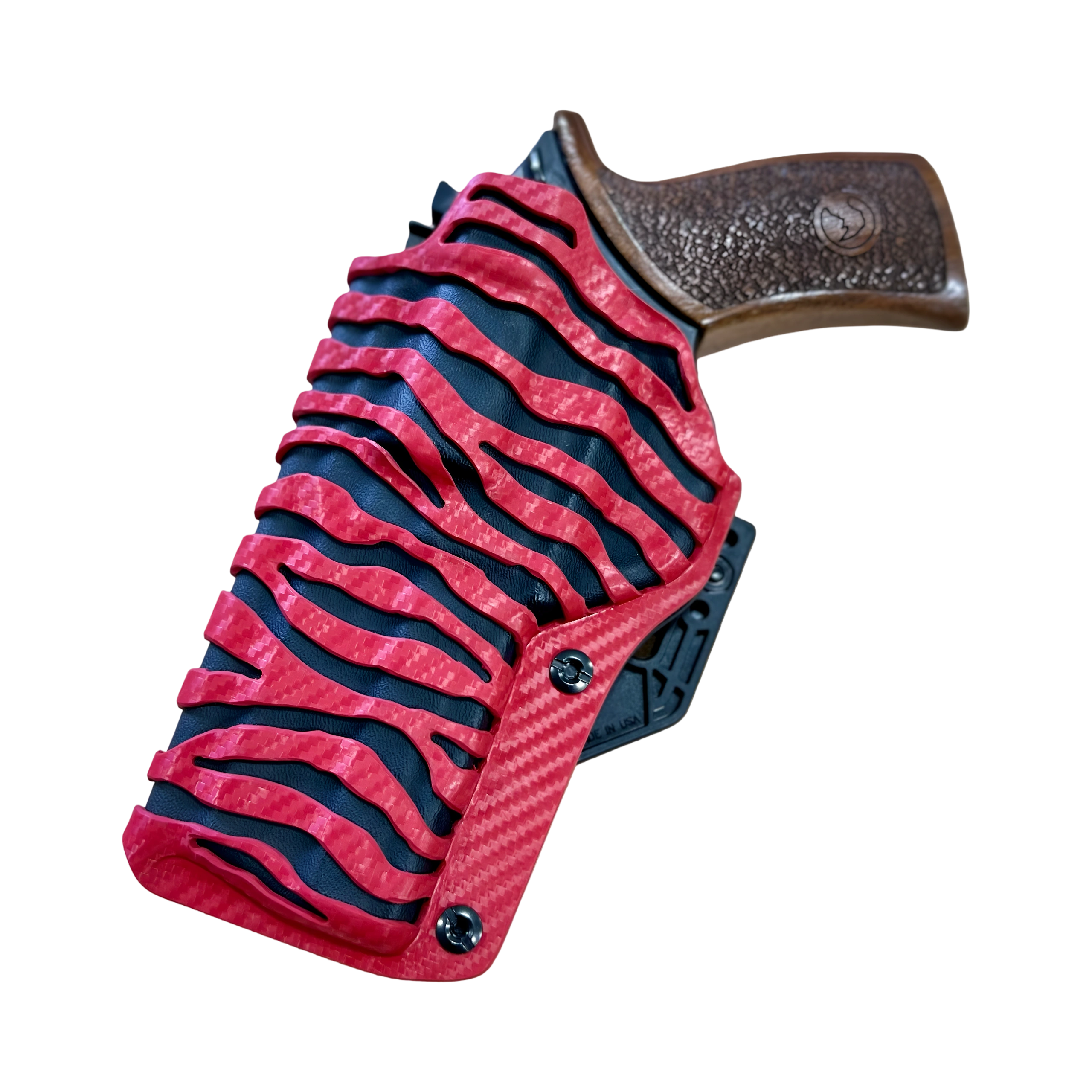 Close-up of a textured firearm grip with red and black design elements.