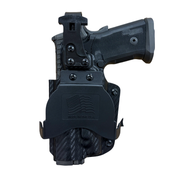 Close-up of a Sig Sauer handgun grip in a tactical holster.