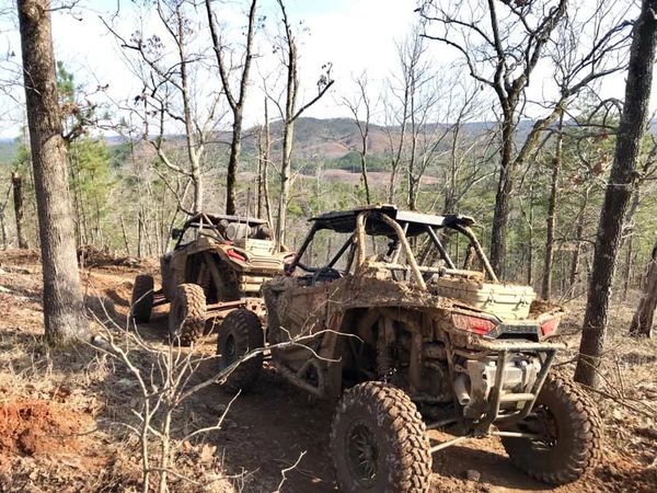 Polaris RZR trail riding in the woods at Indian Mountain ATV Park in Piedmont, Alabama.