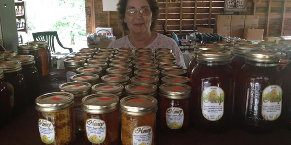 A photo of some of the jams and jellies that Bryson's Apple Orchard offers at the road side apple st