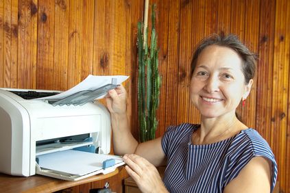 Smiling lady needs printer repair in Sun City Az
