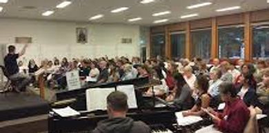 Andrew Wailes directs a MUCS rehearsal at the Frewin Room, St Mary's College, Uni of Melbourne 