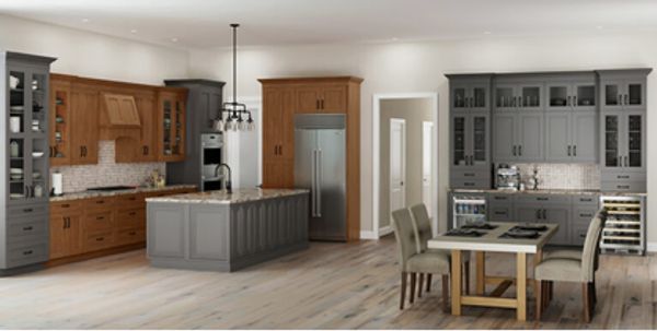 Modern kitchen with wood and gray cabinets and dining area.