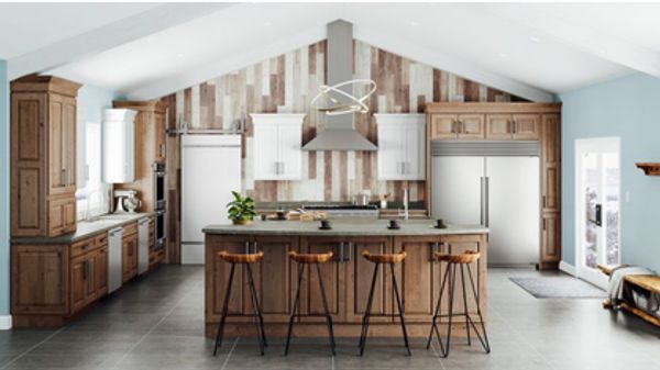 Modern kitchen with wooden cabinets and island.