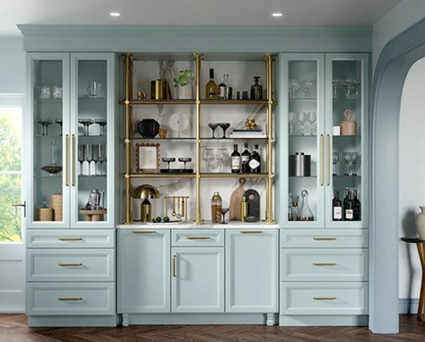 Modern light blue kitchen cabinet with glass doors and gold accents.
