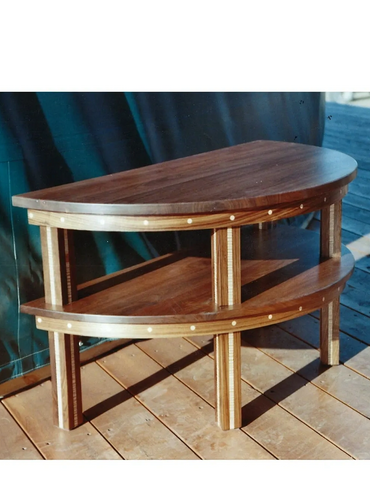 Walnut table with curved aprons. Legs are inlayed with figured curly maple.
