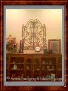 Wrought Iron Gate Above Armoire