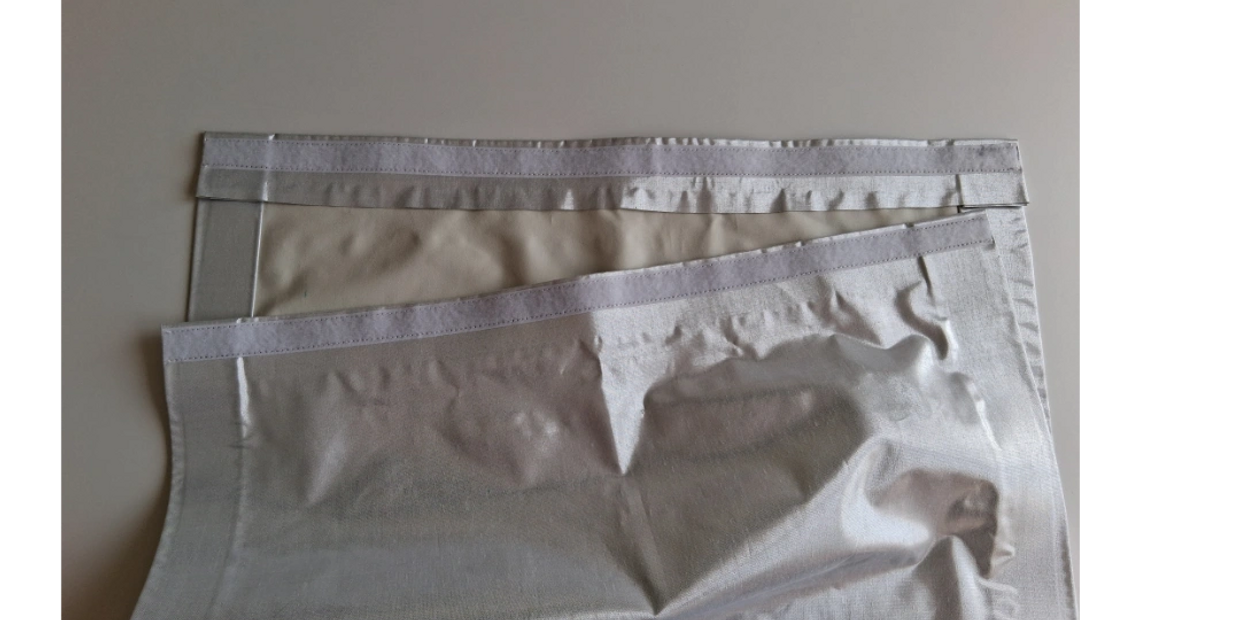 Silver curtain linings show reversable contrast.