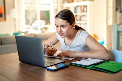 Online tutoring girl studying