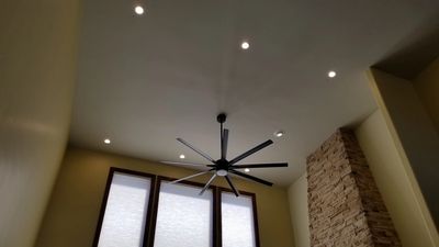 Cathedral ceiling with professional installed ceiling fan and recessed lighting. 