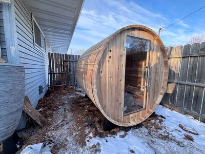 Electrical installation for a backyard sauna with dedicated circuits and panel upgrades for safe, re