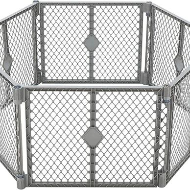 Gray plastic baby or pet playpen with mesh sides.