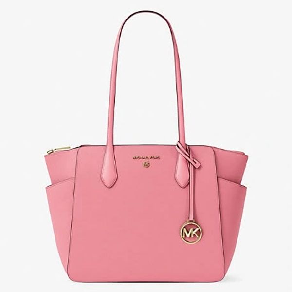 Pink Michael Kors tote bag with gold logo charm and side pockets.