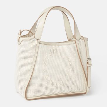 Beige woven handbag with handles and an adjustable strap.