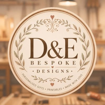 Elegant logo for D&amp;E Bespoke Designs with floral accents.