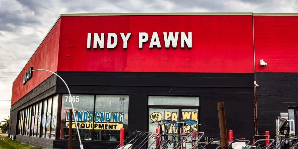 Indy Pawn store with red and black exterior.