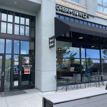 Dream Bowls storefront with outdoor seating.
