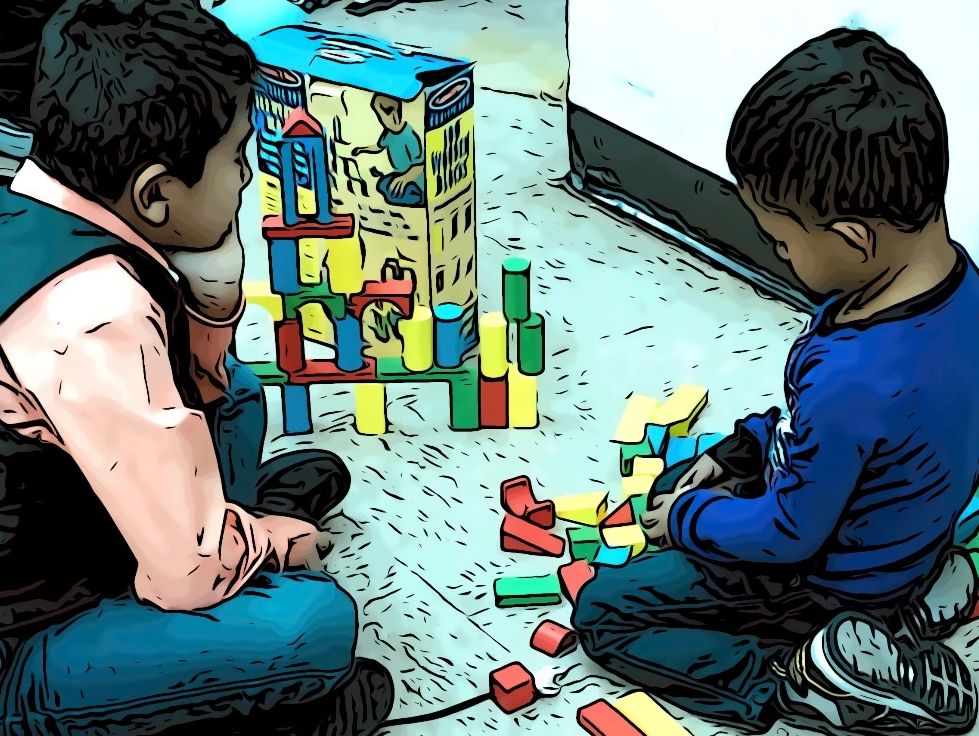 Migrant children playing with blocks