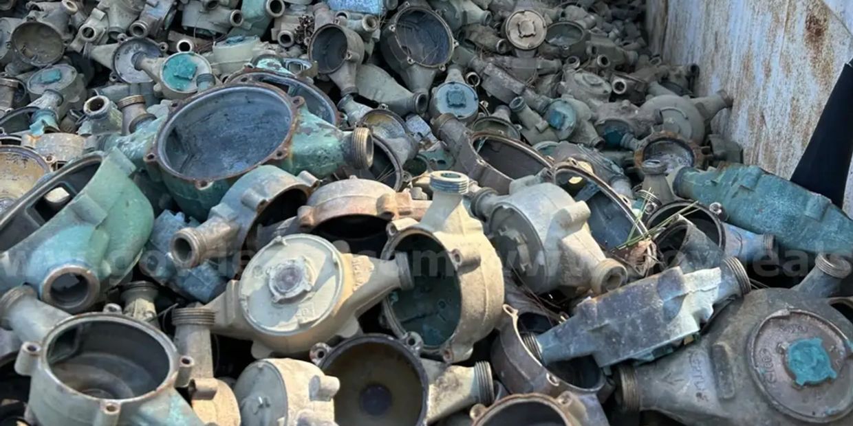 Pile of old metal water meters.