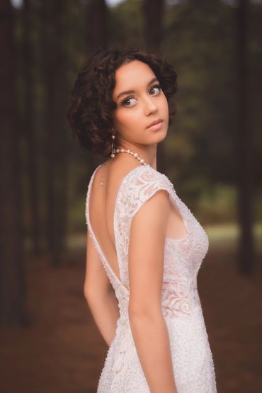 bride in wedding dress in the forrest 