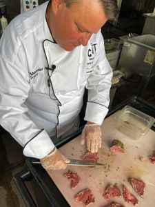 Grill Master Tony preparing carpaccio.