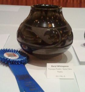 Black Carved Bowl with Animal Design - First Place Div C