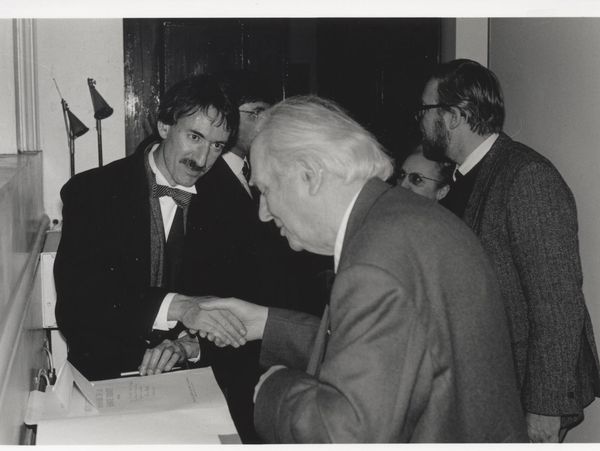 two people shaking hands.