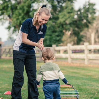 Jess Paediatric Physiotherapist playing wih toddler