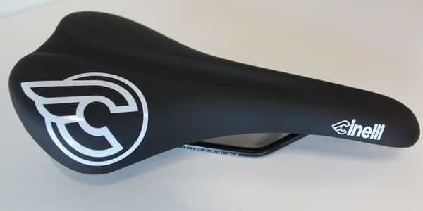 Black Cinelli bicycle saddle with white logo.