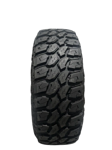 Close-up of off-road tire tread.