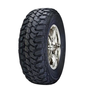 Close-up of a rugged all-terrain tire with a chrome rim.