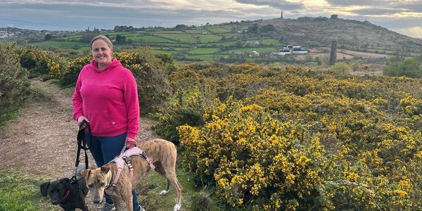 Picture of Dr Nicola Carrier with her two rescue lurchers