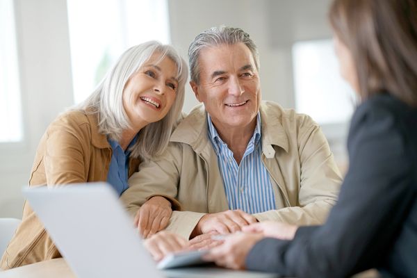 Happy clients talking to accountant