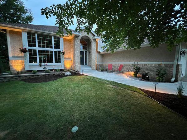 Minnesota front foundation landscape renovation with landscape lighting