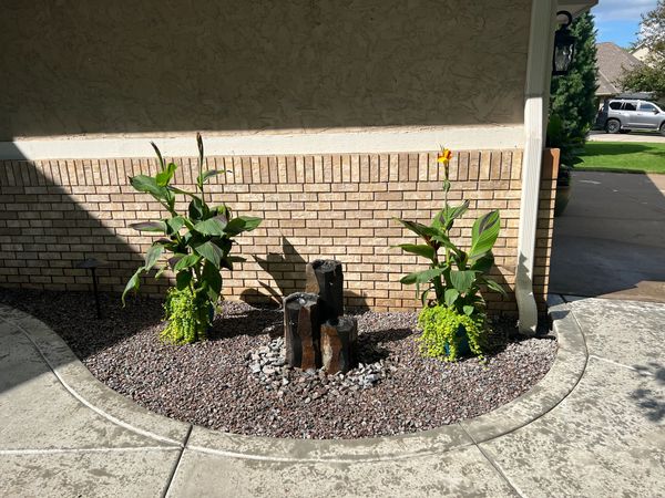 3 Tier bubbling basalt rock fountain with new front sidewalk