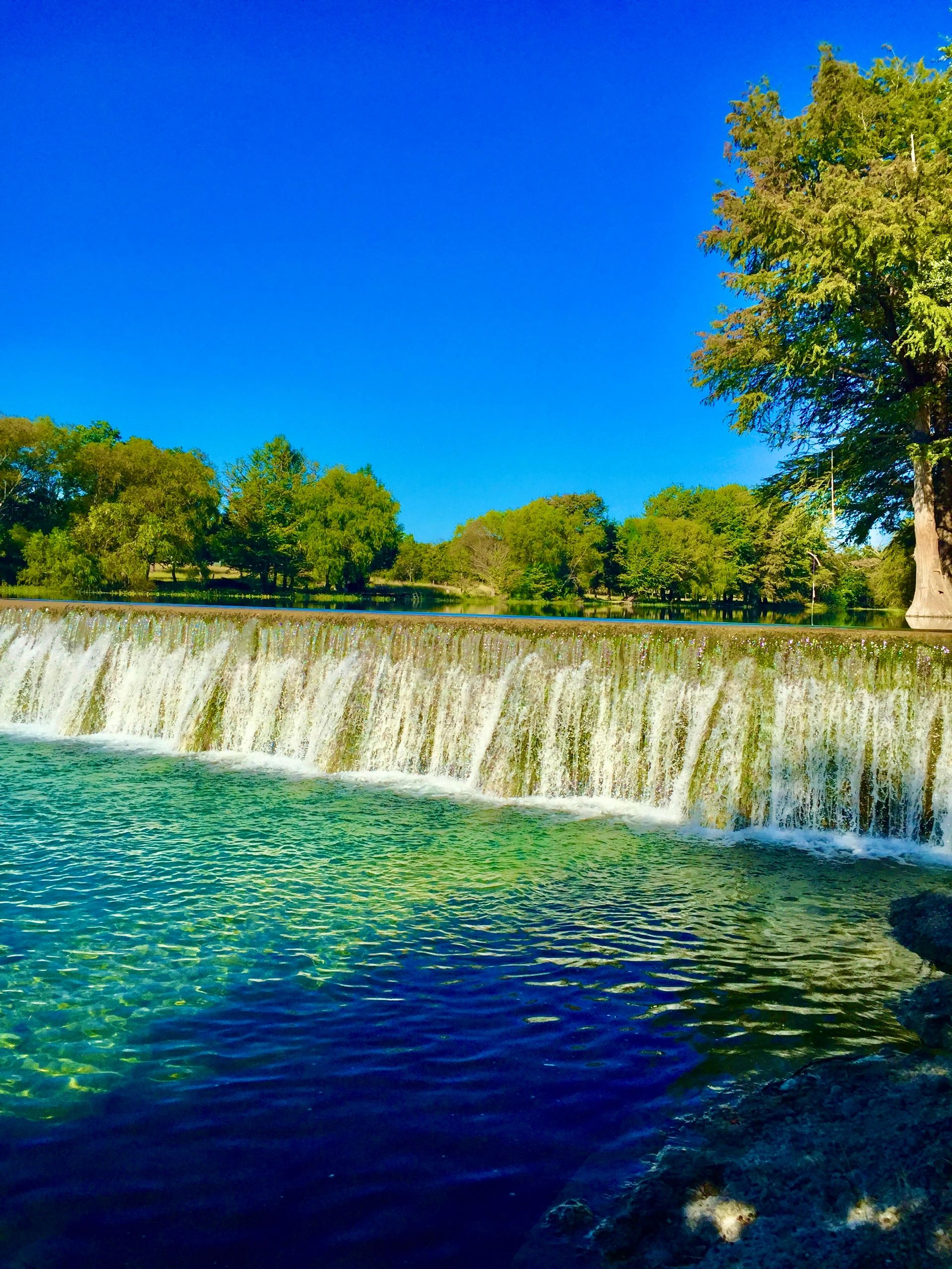 Concrete Dam cleaned out by 3R Sodbusters. This beautiful dam is now free of dangerous debris