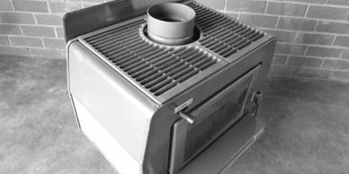 Old norseman or maxiheat, wood heater fireplace.