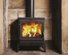 Black esse 700 freestanding multi fuel wood heater with large viewing glass door.