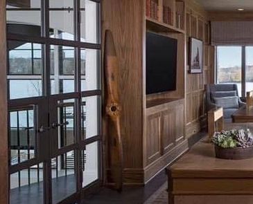 Orchard lake, Michigan  luxurious French doors  made out of aluminum and glass with Rocky Mountain h