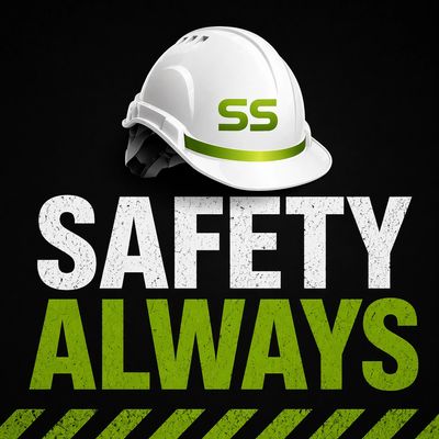 White safety helmet above bold safety awareness text on black background.