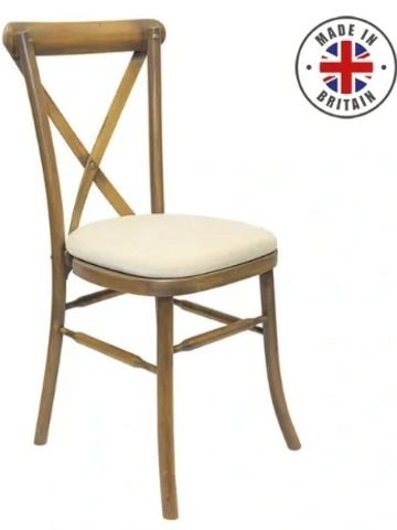 Wooden cross back dining chair with a cream padded seat cover