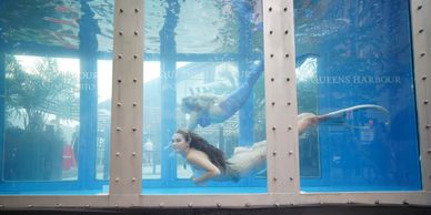 Mermaids Make Waves tank performance at Queens Harbour grand opening in Toronto, Ontario 