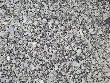 Close-up of crushed gray gravel stones.