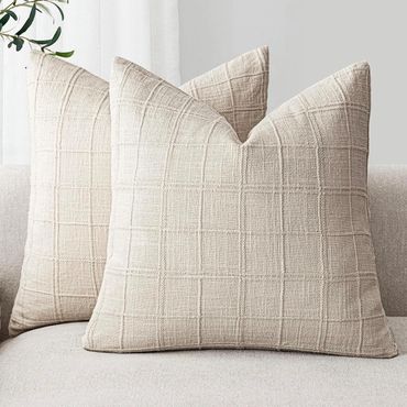 These decorative pillows will add a cozy touch to any room!