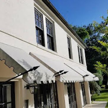Awning, cleaning services, where our professional awning  cleaning method cleaned white awnings at a