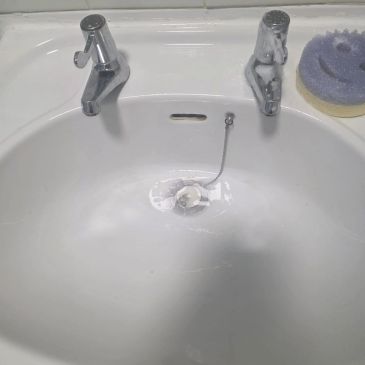 Bathroom sink professionally cleaned and finished to a high standard by Purespark Cleaning Ltd 