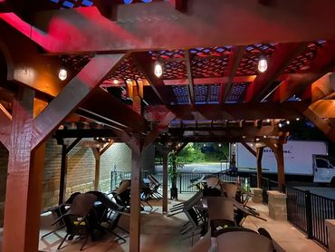 Indoor patio with red lighting.