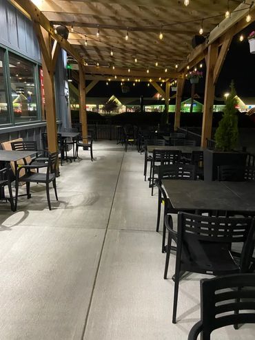 Dimly lit outdoor dining area.

